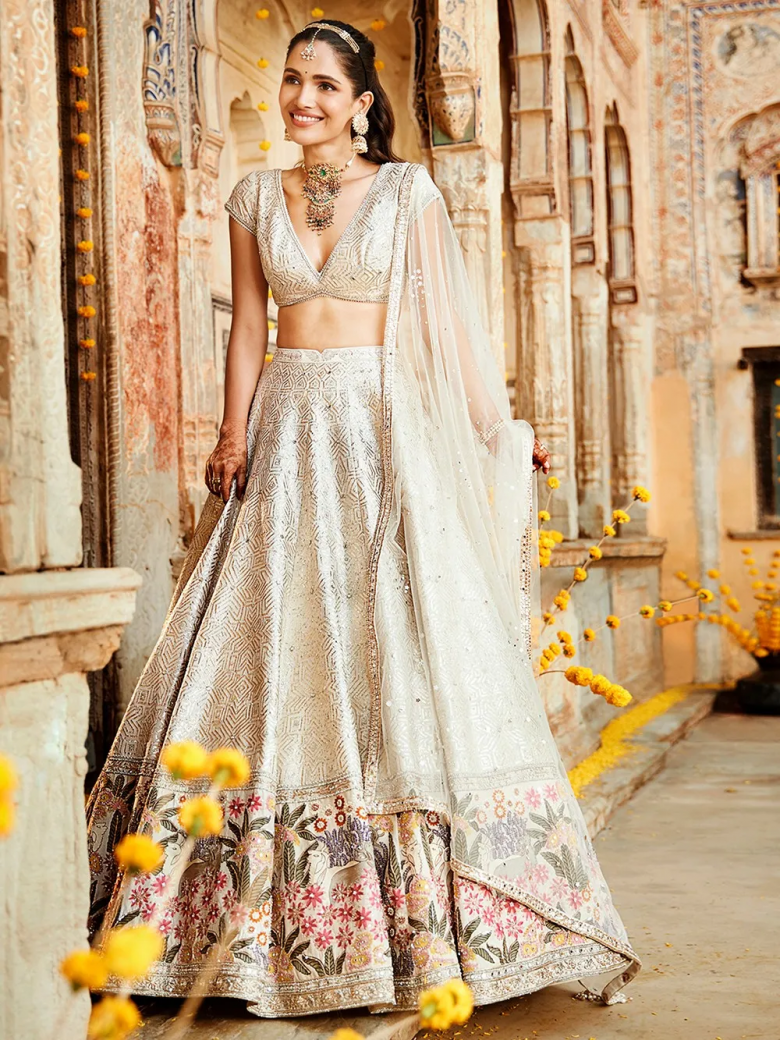 Dazzling Ensemble Featuring Snowy Lehenga And Silver Blouse